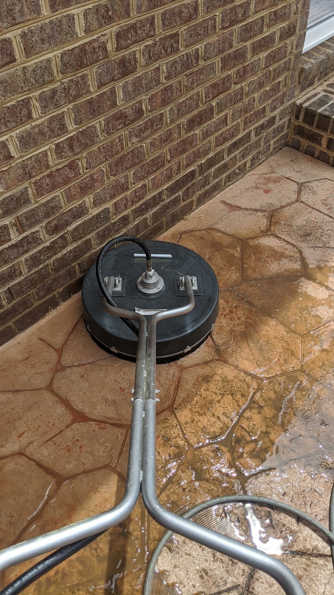 Stamped Concrete Patio — During Pressure Wash
